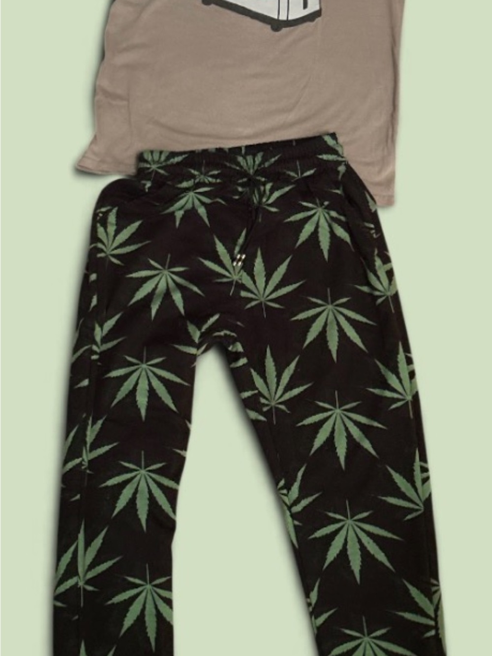Spencer's Black Joggers with Green Leaf Pattern